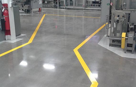 Pedestrian traffic coating with traffic lines in factory.